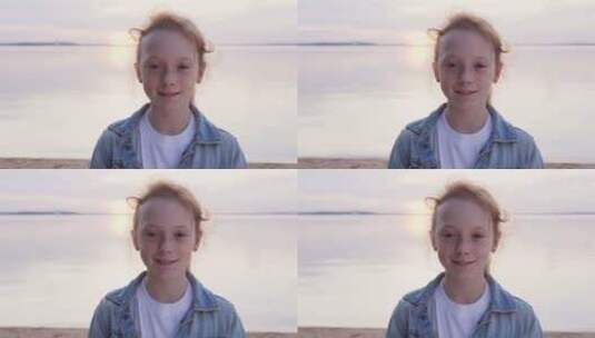 日落时海边有雀斑的红发女孩高清在线视频素材下载