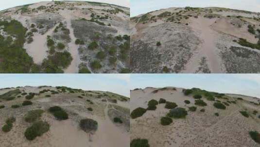 FPV无人机拍摄了令人惊叹的贫瘠小径、沙丘和陡峭的斜坡，树叶茂密高清在线视频素材下载