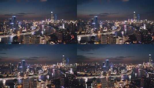 航拍上海滨江两岸城市CBD建筑群夜景高清在线视频素材下载