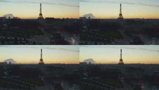 航空：在美丽的法国巴黎上空升起，展示埃菲尔铁塔，在史诗般的日落中游览埃菲尔铁塔高清在线视频素材下载