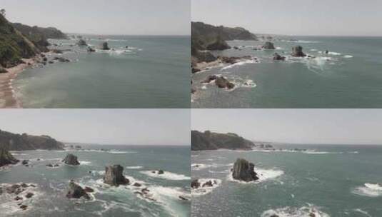 阿斯图里亚斯岩石和强浪海滩的鸟瞰图高清在线视频素材下载