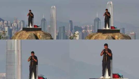 站在香港宝马山顶自拍高清在线视频素材下载