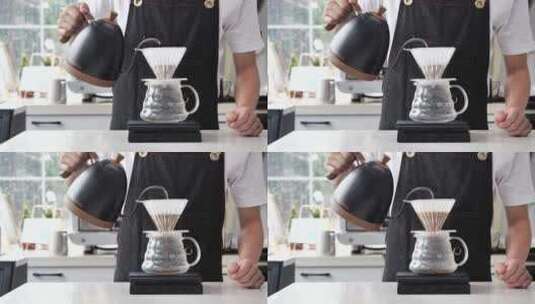 咖啡师用倒入热水制作咖啡滴水高清在线视频素材下载
