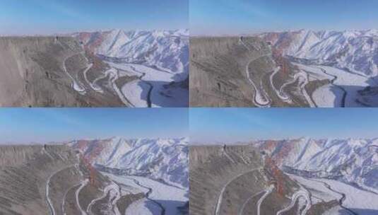 航拍新疆冬季安集海大峡谷红色山脉雪山河流高清在线视频素材下载