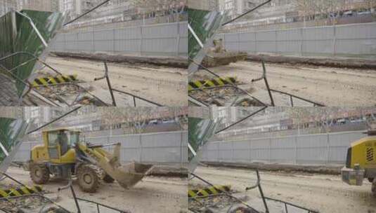 城市道路施工挖掘机运输施工高清在线视频素材下载