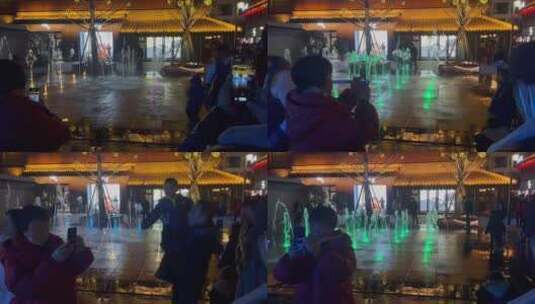 文旅商业街广场地表喷泉围观拍照的人2高清在线视频素材下载
