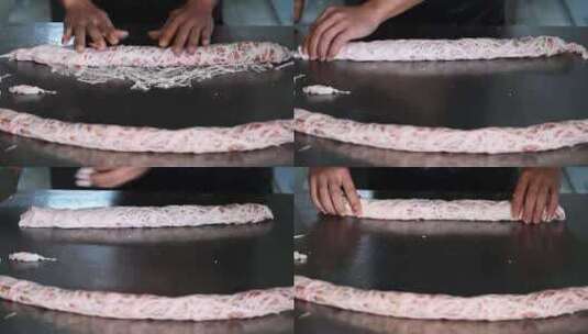在厨房制作桂林特色肉制品食物“欢喜”高清在线视频素材下载
