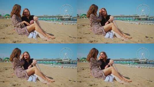 快乐的浪漫夫妇有一个第一次日期上的海滩-高清在线视频素材下载