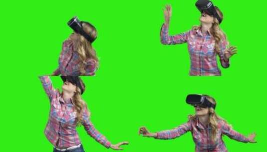女人在玩虚拟眼镜高清在线视频素材下载