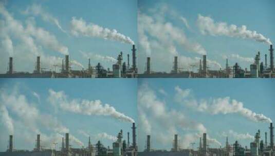 发电厂烟囱里的浓烟飘向天空高清在线视频素材下载