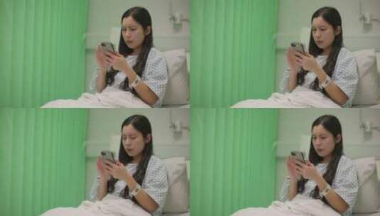 女人坐在病床上使用手机高清在线视频素材下载