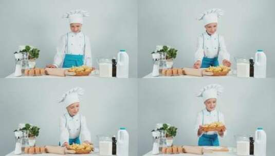 穿厨师服在镜头前展示的女孩高清在线视频素材下载