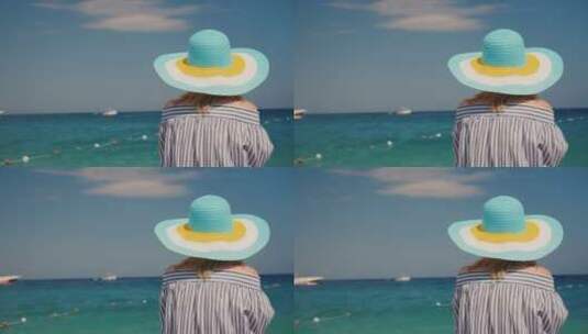 戴帽子的女人欣赏大海后视图高清在线视频素材下载