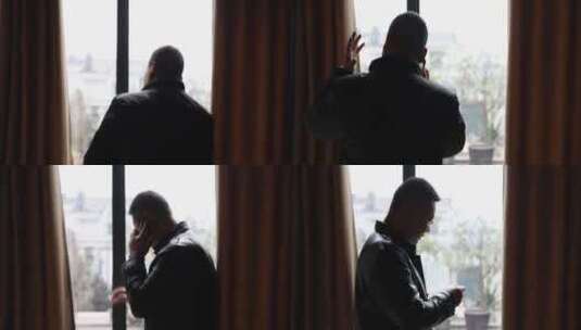 一个男人在阳台接电话 抽烟争执压力大4k高清在线视频素材下载