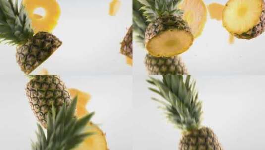 菠萝和切片在白色背景下飞行高清在线视频素材下载