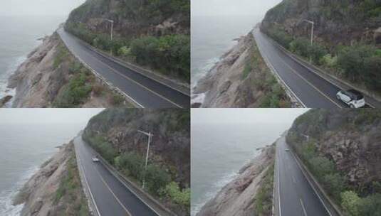 4K航拍海边公路车开过高清在线视频素材下载