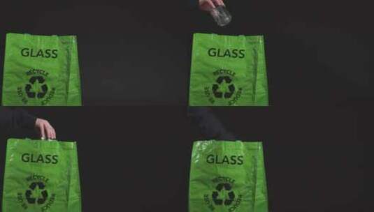 把玻璃瓶放到可回收垃圾袋里高清在线视频素材下载