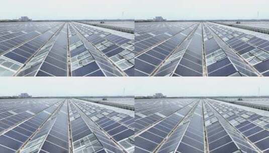 玻璃温室房顶的太阳能光伏发电面板高清在线视频素材下载