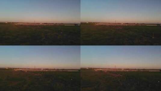 无人机拍摄下的日落农场高清在线视频素材下载