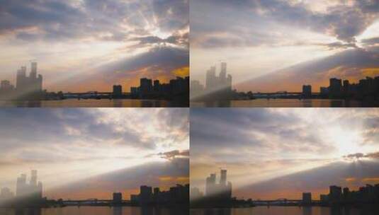 城市阳光穿透云层 耶稣光丁达尔效应高清在线视频素材下载