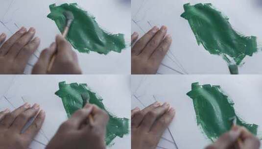 纸上绿色的艺术画笔高清在线视频素材下载