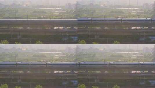 城市乡村铁路上行驶的高铁动车高清在线视频素材下载