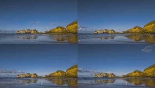 从美丽的海滩延时的岩石拱门高清在线视频素材下载