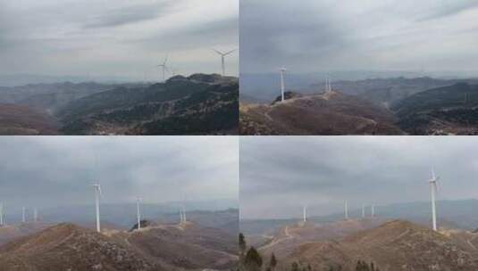 山顶上风力发电机高清在线视频素材下载