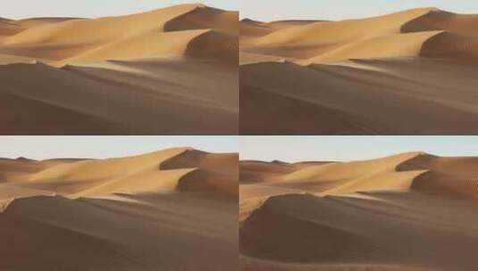 风吹动撒哈拉沙漠金色沙子流动_4K高清在线视频素材下载