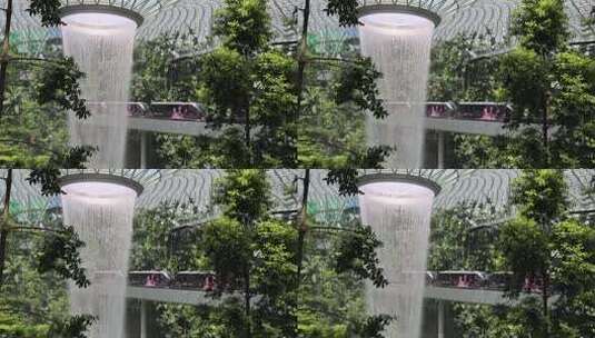 新加坡樟宜机场瀑布与网红小火车高清在线视频素材下载