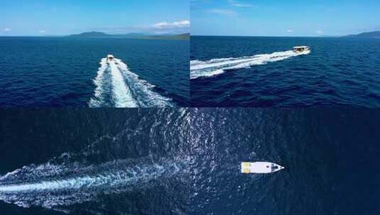 国外大海印尼美娜多潜水胜地快艇在海面航拍高清在线视频素材下载