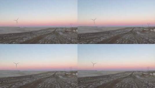 内蒙古 白云鄂博矿区 粉红色朝霞中的风车高清在线视频素材下载