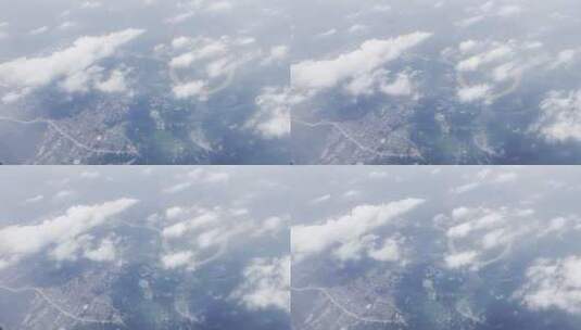 飞机舷窗外白云朵朵和美丽地祖国大地高清在线视频素材下载