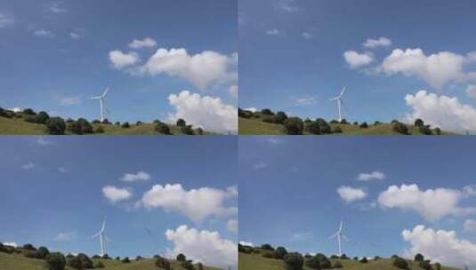晴天下的风力发电机高清在线视频素材下载
