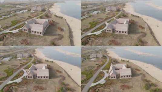 4K航拍威海荣成百合湾海草房--高清海滩2022高清在线视频素材下载