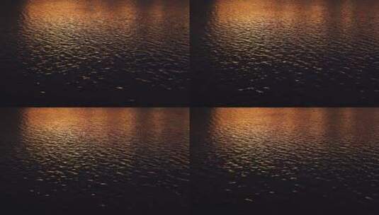 夜晚湖面水面海面灯光波光粼粼俯拍特写波纹高清在线视频素材下载