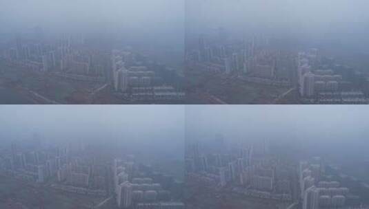 大雾雾霾俯瞰城市高楼建筑工地前飞高清在线视频素材下载