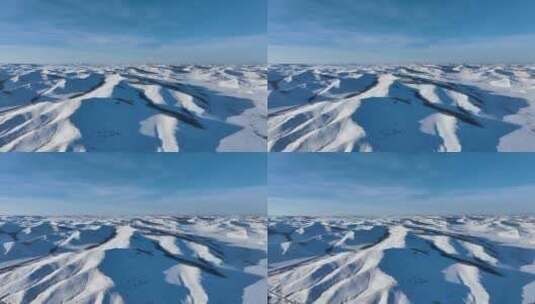 航拍冰雪覆盖的雪原雪岭高清在线视频素材下载