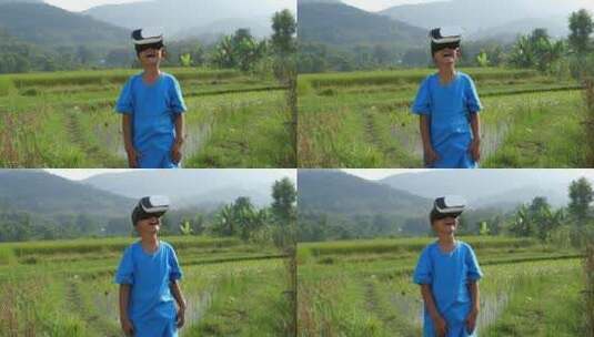 男孩在田野体验虚拟现实眼镜高清在线视频素材下载