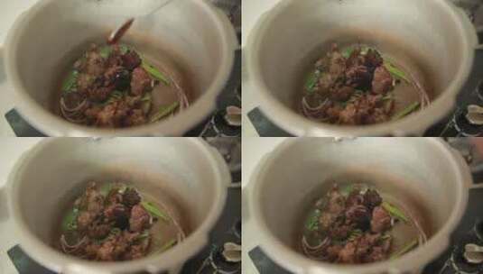 高压锅加入去腥底料炖牛肉高清在线视频素材下载