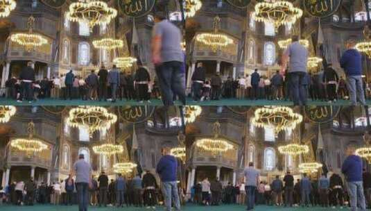 人们在圣索菲亚大教堂祈祷的低角度镜头高清在线视频素材下载