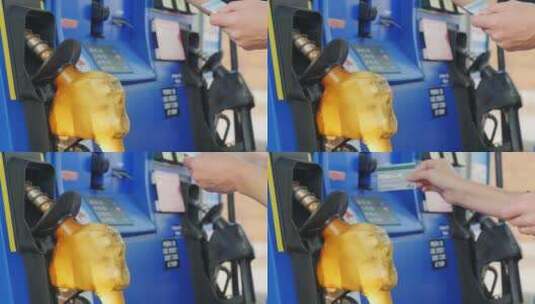 男子在加油机器上加油高清在线视频素材下载