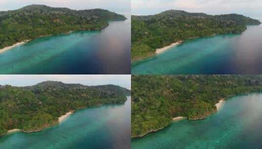 空中：飞越哈达岛白色沙滩班达群岛印度尼西亚高清在线视频素材下载