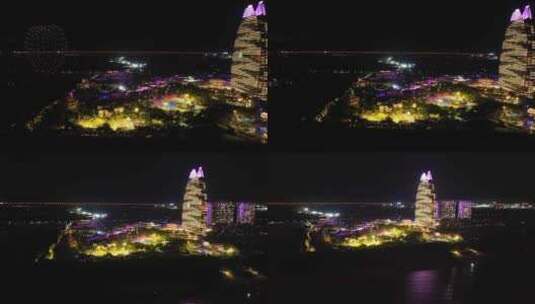 航拍三亚海棠湾夜景无人机灯光秀亚特兰蒂斯高清在线视频素材下载