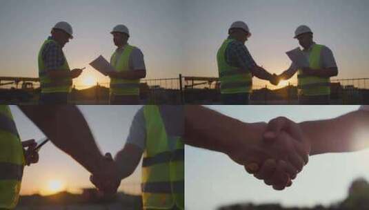 两个建筑工人握手合作高清在线视频素材下载