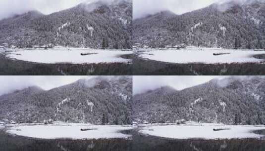 西藏林芝巴松措，雪山森林雪地的雪景风光高清在线视频素材下载