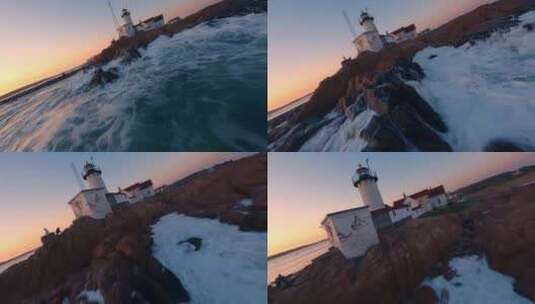fpv航拍灯塔海边日出海浪旋转视角高清在线视频素材下载