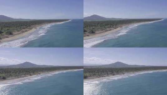 无人机拍摄的加勒比海滩与山脉和李树和山脉高清在线视频素材下载