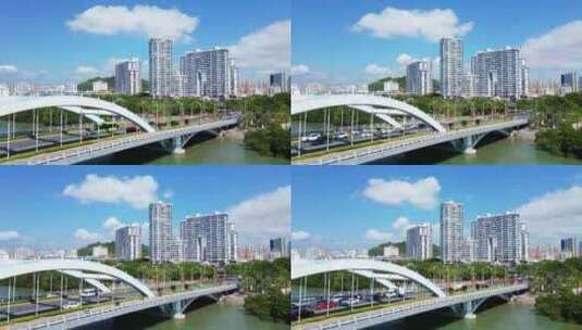 海南省三亚市蓝天白云下的三亚河月川桥高清在线视频素材下载