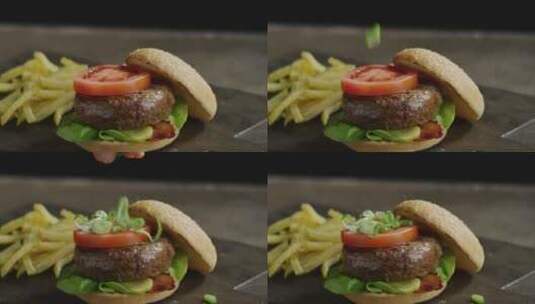 汉堡制作洒葱花高清在线视频素材下载